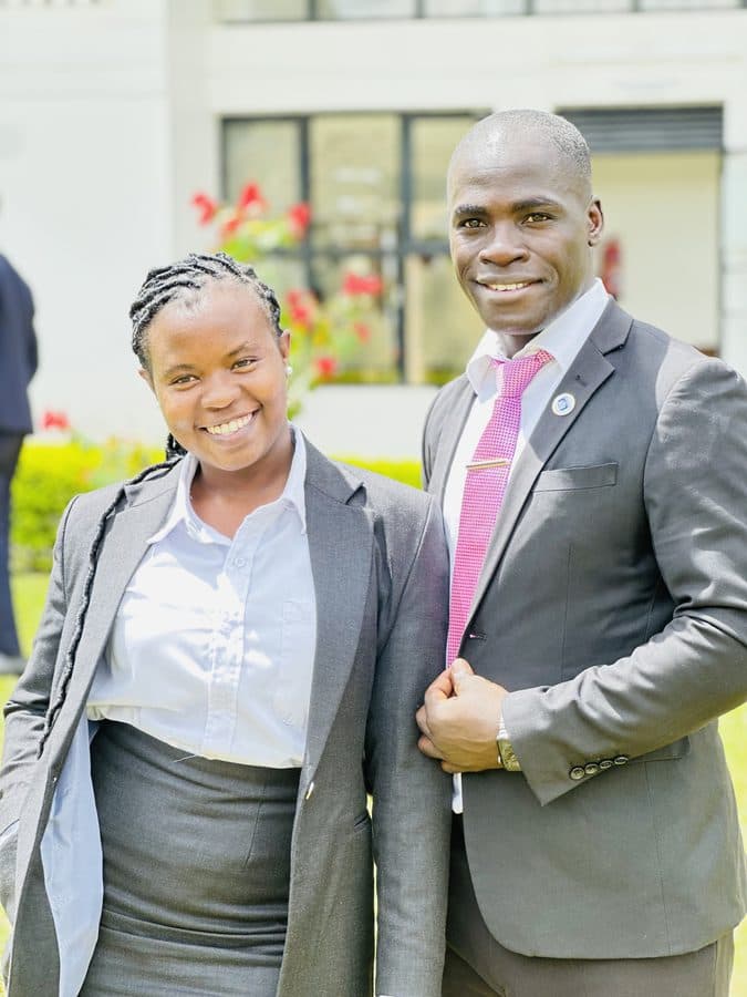 Paul Bugembe with a colleague