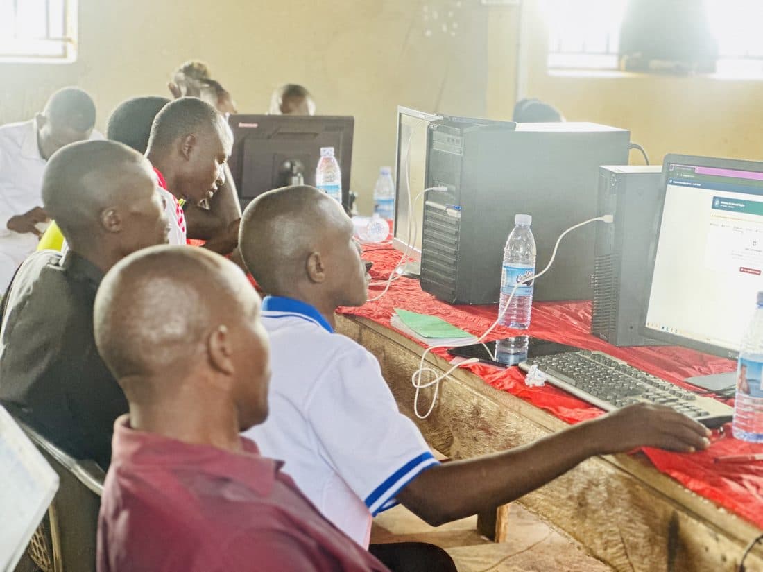 School staff being trained on SIMS at their own computers
